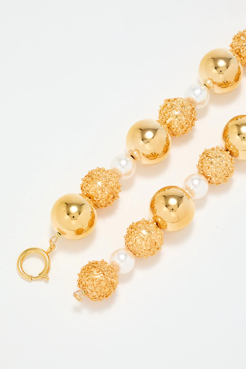 Gold Sculptural Necklace With White Pearl Detail - Image 6